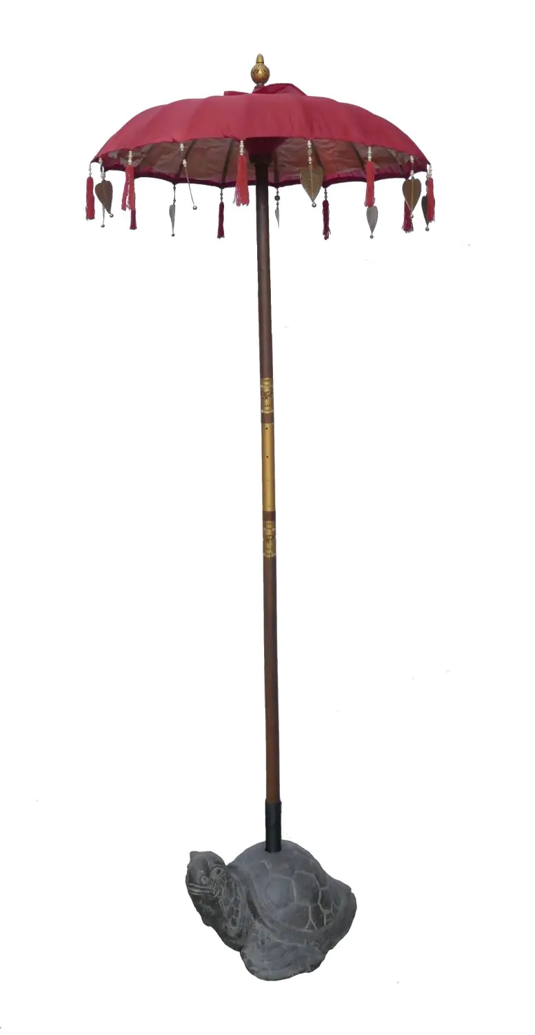  Product image 1 of the product “Bali umbrella, Red with wooden coins and gold leaves hanging around the edge. Approx. 100cm dia. and 250cm height ”